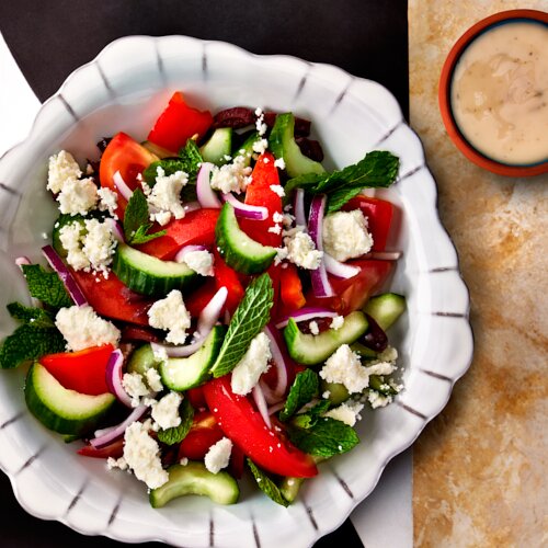 Photo of Tomato & Cucumber Salad from Chios Taverna by Michael Symon